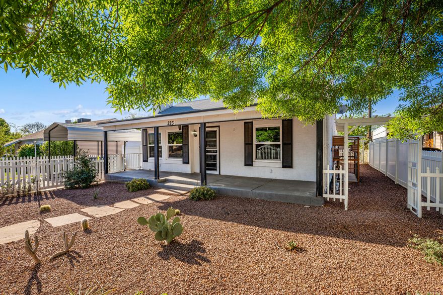 Updated downtown gem blending classic character with modern upgrades! This charming 1946 home features new flooring, windows, HVAC, plumbing, electrical updates, attic insulation, countertops, and a stunning primary bathroom. Fall in love with the secluded backyard, designed for both relaxing and entertaining, featuring a spacious deck, an ample storage shed, and multiple shaded areas. It's all in the heart of St. George and within walking distance to local restaurants and shops. A fun bonus is the installed ''Catio''! Per county records, the home includes a 4th bedroom and additional square footage, represented by a detached finished flex space- perfect for a home office, studio, or hobby room.