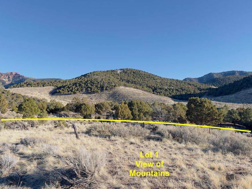 Enjoy breathtaking views of Parowan City, the surrounding mountains, and Heritage Park below from this .6-acre undeveloped lot offering exceptional privacy and a one-of-a-kind setting.