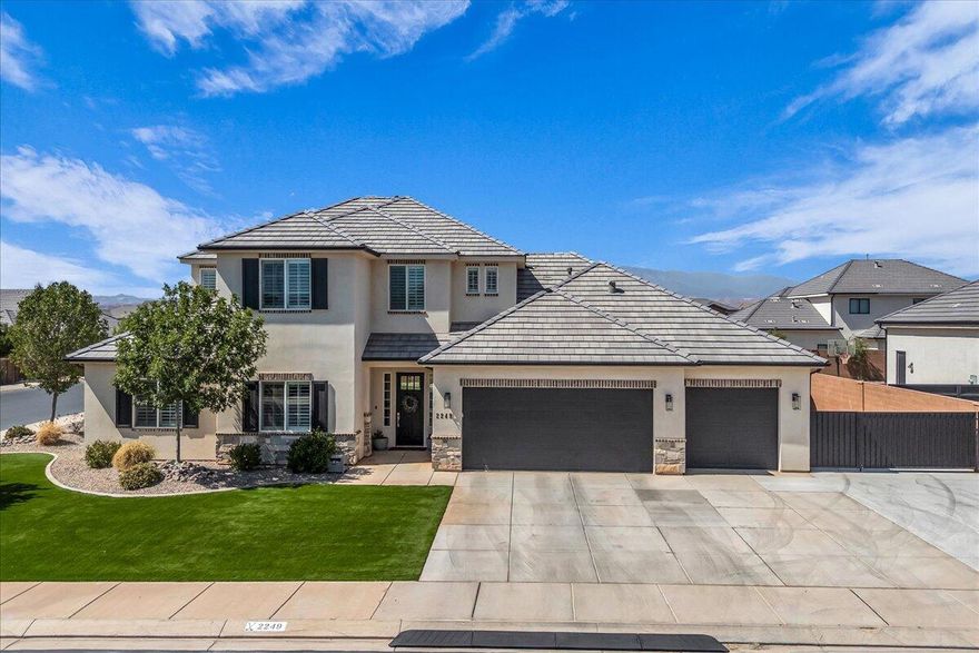 Custom home located in the highly sought after Fieldstone neighborhood within Little Valley. Thoughtfully designed with quality finishes throughout. This home offers a spacious open concept living area with custom built in shelving, cozy fireplace and large windows that flood the space with natural light. The kitchen is a showstopper, featuring quartz countertops, gas cooktop, double wall ovens, a hidden walk in pantry and custom cabinetry extending to the ceiling. A functional mud room and well appointed laundry room provide additional storage. Upstairs includes a second family room, three additional bedrooms, and two baths. The expansive backyard is perfect for entertaining, complete with an in ground trampoline, putting green, storage shed and large cement pad for RV Parking. Plenty of room to add a pool.