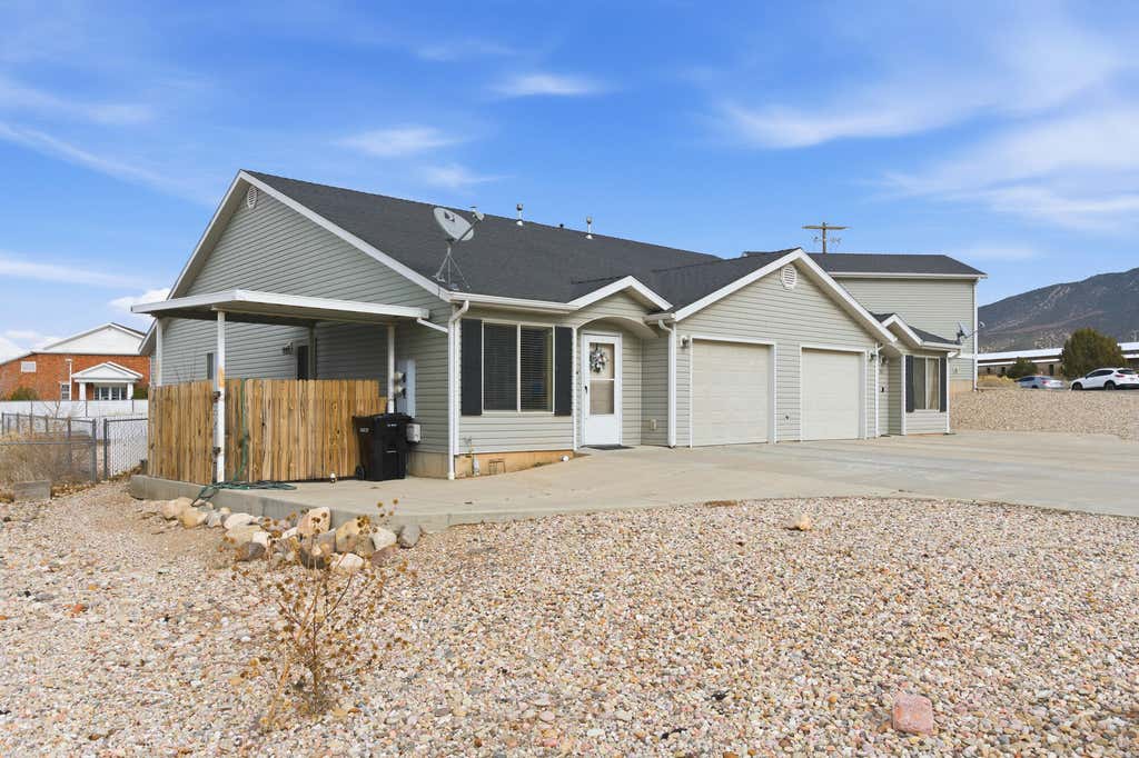 Photo of 591-593 E Nichols Canyon Road + RV Garage #+ RV Garage, Cedar City, UT 84721 (MLS # 26-274152)