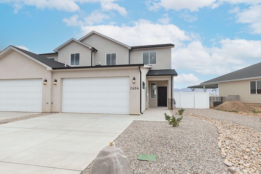 New Construction in Cedar City, Utah! This stunning 4 bed, 2.5 bath home features a spacious main-level master suite, elegant stone countertops, and 9-foot ceilings throughout. Abundant natural light and a bright fills the home, open floor plan with two inviting family rooms—perfect for entertaining or relaxing. The modern kitchen boasts quality finishes and plenty of storage- and a pocket Office Office. Fully finished with landscape, blinds and fencing included. Thoughtfully designed for comfort and function, this home combines style, space, and convenience in a desirable neighborhood. Seller is offering $3,500 toward Buyer's Closing Costs when using preferred lender.