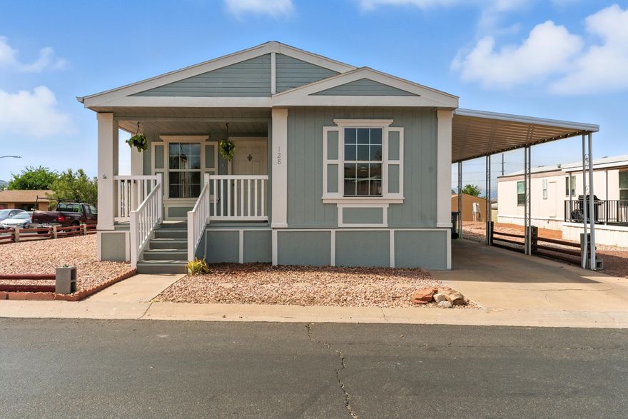 Bright, Open, and Move-In Ready on a RENTED LOT! This clean and well-cared-for home sits on a spacious corner rented lot and stands out in its price range. Large windows, vaulted ceilings, and an open layout give it a light, airy feel throughout. It's easy to convert into a 3-bedroom if desired. Recent updates add to the appeal, along with a large 2-car carport and a custom-built detached storage shed. Located in a quiet, friendly neighborhood with combined HOA fees and lot rent totaling $600 per month, this home offers convenience without sacrificing comfort. Quick access to shops, restaurants, and everyday necessities makes daily living easy. A rare find at this price—comfortable, functional, and full of natural light. Buyer/buyer's agent to verify all information.