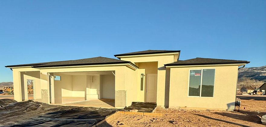 Welcome to The Ammond — a beautiful new construction home in the desirable Valley Gate Estates community! This thoughtfully designed single-level floor plan offers 1,530 sq. ft. of modern comfort, featuring 3 bedrooms, 2 bathrooms, and a spacious 3-car garage. Step inside to find an open-concept layout that perfectly blends functionality and style. The kitchen flows seamlessly into the living and dining areas, creating the ideal space for entertaining or relaxing with family. The private primary suite includes a walk-in closet and a well-appointed ensuite bathroom for added comfort. Enjoy the convenience of single-level living, quality craftsmanship, and the peace of mind that comes with owning a brand-new home.