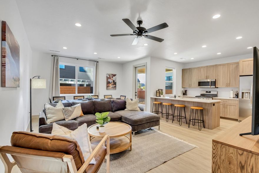 **Open House this Saturday the 28th 10:30 AM to 1:30 PM.** This is your opportunity to own 1/4 share of this beautiful fully furnished townhome. This townhome the very best unit in the entire community as was selected by the owner at the beginning of the development. It is conveniently located by the St George Aquatic Center, Snake Hollow Bike Park, Snow Canyon High School, Santa Clara Arboretum, Santa Clara BMX track, Santa Clara library, new Summit Athletic Club, restaurants, and shopping. It is also located minutes from St George Blvd, Snow Canyon State Park, Black Desert and other golf courses, and Tuacahn. There is an abundance of natural light thanks to it being an end unit with six additional windows. The property includes stainless steel appliances, tall ceilings, and a loft area with a sofa-sleeper. The community has a pool and pickleball court. The private back yard is arguably the largest in the community, includes a pergola and is stubbed for natural gas grill and electrically stubbed for a hot tub. Owner is also selling unit #47 located directly behind this unit if interested in having additional ownership in an adjacent unit.