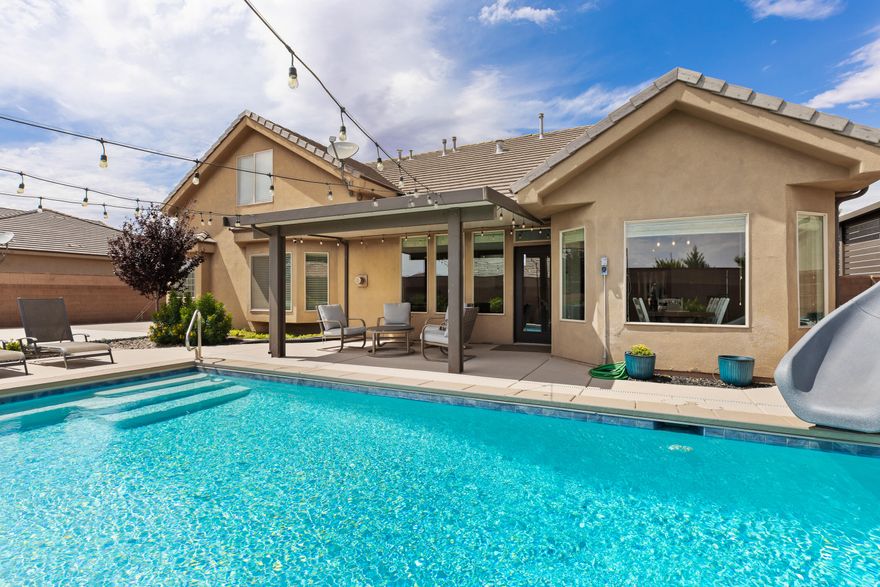 Fully Updated in a quiet Cul-De-Sac with a new Salt Water Gunite Pool with a slide, cover and natural gas heater, large covered patio, plenty of room for RV/Boat parking under the spacious covered parking area on the side of the garage, Recently updated: paint, flooring, carpet, baseboards, outlets, fireplace surround & mantle, appliances, covered patio, LED lights, lighting fixtures, ceiling fans, over cabinet lighting, painted garage doors, cabinet knobs, toilets, kitchen faucet, soaking tub in primary bath, tile in 2 of 3 bathrooms, epoxy garage floor, and some blinds. Great, open layout with vaulted ceilings, natural gas fireplace and drop in cooktop, granite tops, stainless appliances, dining nook with door to covered patio, storage shed, B-Ball court, block walls & gates, courtyard in the front & water softener. Main level features: 3 beds, 2 baths, kitchen, great room, dining, laundry & 3-car garage. Upper-level features: 2 bed, 1 bath, family room & storage room.*All information is deemed reliable but not guaranteed, buyer to verify all.