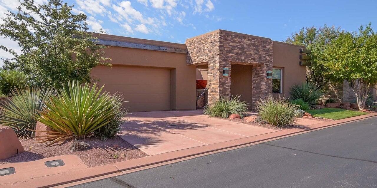 Immaculate, well cared for home in Toroweap at Entrada. The inviting courtyard includes a metal entry door. The floor plan is open and bright and includes a 42'' linear fireplace with blower, large master closet and kitchen pantry, plus an attached casita with its own courtyard entry and separate A/C unit. Come enjoy the peaceful outdoor living space maintained by Entrada. Recent improvements include a GE refrigerator and oven, Bosch dishwasher, Reverse Osmosis system, and new blinds throughout. Entrada is southern Utah's premier gated golf course community. The lifestyle includes a restaurant, clubhouse and community events. The clubhouse includes two pools, fitness center with a variety of daily classes, spa, pickle ball, tennis and volleyball.