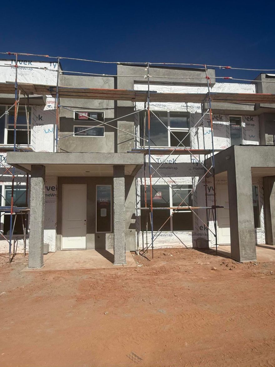 This inviting 3 bedroom, 2.5 bathroom townhome boasts a prime location just moments away from Zion Shores surf park, Warner Valley, and Sand Hollow making it perfect for outdoor enthusiasts and adventure seekers. The spacious living area flows seamlessly into a well-appointed kitchen complete with stainless steel appliances. The generous primary bedroom is complete with an en-suite and walk in closet. Two additional bedrooms provide plenty of space for guests, a home office, or hobbies and they share a stylishly designed full bathroom. A convenient half-bath is located on the main level. Step outside to enjoy your own covered patio where you can enjoy views of Warner Valley and Pine Valley.