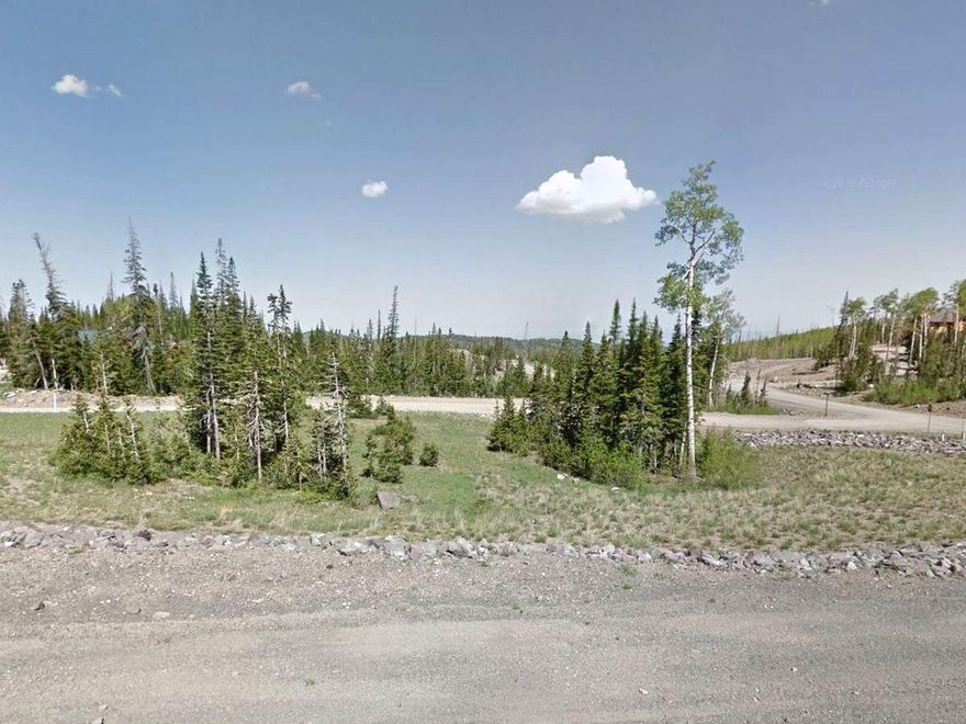 Beautiful building lot located at Steam Engine Meadow at Brian Head. This slightly sloped lot is framed with pine trees and has a majestic view overlooking the colorful mountains and valley. The slope will provide a future cabin with a walk out basement. The lot includes all city services including power, water, sewer, natural gas, phone/internet, and paved roads with year round access. The Steam Engine Meadows subdivision has recorded CCR's with larger lots and some beautiful cabins. Brian Head Ski Resort is known for its great family ski and snowboarding retreat and this lot is located only minutes from the Ski Slope. The resort is also excellent for tubing, ski schools, cross country skiing, recreational racing and kid camp. In the summer and fall the surrounding mountains and forests offer some of the finest mountain biking trails and rock climbing in America. Brian Head is minutes away from Cedar Breaks Nation Monument and centrally located between Zion National Park and Bryce Canyon. Call today for more information.