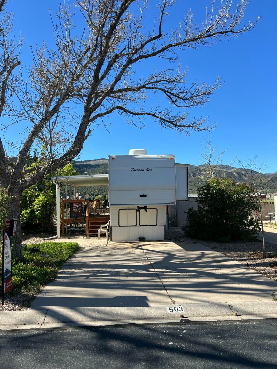 Premier RV Lot with 5th wheel trailer for sale in Foothills RV Park. Why rent an RV spot when you could buy? Comes with a 37'x8' 5th wheel with 2 slide-outs for additional sqft. The deck and awning have already been added for buyers enjoyment. Trailer comes with furniture and furnishings! It is ready for the new buyer. This rare, premier lot borders the outside edge of the park for spectacular mountain views! Low monthly HOA fees of $109/month cover snow removal, water, sewer and garbage. Foothills RV Park offers a quiet, clean community of just 146 lots, complete with its own clubhouse. The clubhouse offers laundry, showers, and a kitchen. Located in rural Parowan near top outdoor recreation--skiing, mountain biking, fishing, snowmobiling, ATV trails, and hunting. This is the perfect base for adventure seeker.