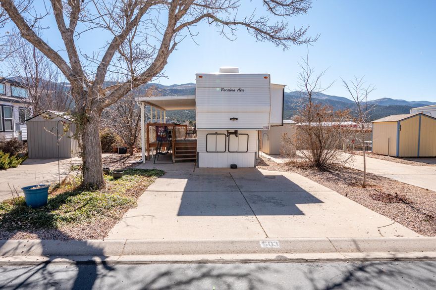 Premier RV Lot with 5th wheel trailer for sale in Foothills RV Park. Why rent an RV spot when you could buy? Comes with a 37'x8' 5th wheel with 2 slide-outs for additional sqft. The deck and awning have already been added for buyers enjoyment.  This rare, premier lot borders the outside edge of the park for spectacular mountain views! Low monthly HOA fees of $109/month cover snow removal, water, sewer and garbage. Foothills RV Park offers a quiet, clean community of just 146 lots, complete with its own clubhouse. The clubhouse offers laundry, showers, and a kitchen. Located in rural Parowan near top outdoor recreation--skiing, mountain biking, fishing, snowmobiling, ATV trails, and hunting. This is the perfect base for adventure seeker.