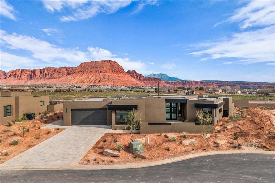 Experience luxury living at it's finest in this brand new, custom built masterpiece. Showcasing breathtaking views of the majestic Red Mountains. This stunning residence boasts a private pool that is 37 X 17 with 3 spill ways, accent planter and integrated spa. Enjoy relaxing by the fire pit with built in benches.  The heart of the home is the gourmet kitchen with panel ready thermador refrigerator/freezer and dishwasher, matte black stainless steel Zline cook top, double oven and microwave.  Each bedroom offers its own walk in closet. The home also features a dedicated pool room and a casita with a private exterior access complete with a full sized kitchenette, ideal for guests or extended living.This exceptional property offers the ultimate luxury living experience.