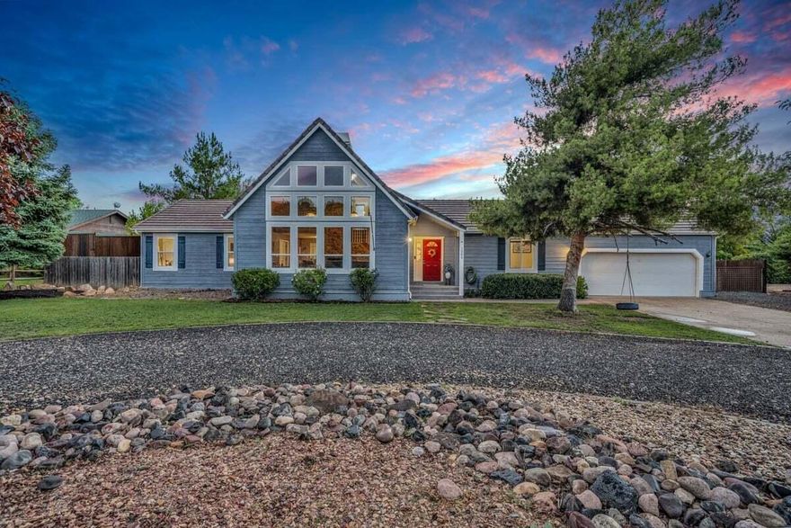 This stunning, thoughtfully updated home perfectly blends warmth, charm, and modern upgrades throughout. The kitchen shines with new granite countertops, tile backsplash, cabinets, and hardware, while all bathrooms have been beautifully remodeled with fresh granite, new tile, and updated fixtures. The inviting master suite features dual sinks, a spacious walk-in closet, and a gorgeous, tiled shower with new hardware. Soaring wood-beamed ceilings, real refinished hardwood floors, and both wood-burning and gas fireplaces create an atmosphere of cozy elegance. Step outside to enjoy volcano and peekaboo views from the newer Trex deck with a spiral staircase, surrounded by a fully fenced yard featuring an irrigated garden, 11 fruit trees, a firepit, and a charming chicken coop, complete with five hens and a rooster! With RV parking, two outdoor sheds, a new HVAC system, and a garage with a sink and workbench, this property truly offers comfort, convenience, and character in every detail. Buyer to verify all information, deemed reliable, however buyer to verify all info including utilities, rental restrictions, and HOA information if applicable.