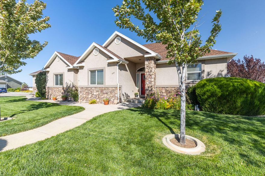 Welcome to Sunrise Meadows in Cedar City, where this custom 3,674-sq-ft home on a half-acre delivers room to live, work, and play. Built in 2007, it features 6 bedrooms, two kitchens, and a walkout basement, giving you smart flexibility for guests, meal prep, hobbies, or WFH. The main level offers easy flow for daily life and entertaining, while the lower level adds second-kitchen convenience and direct backyard access. Outdoors, the spacious lot invites gardens, play, and relaxing evenings. You'll love the location—minutes to parks and trails, Cedar Ridge Golf Course, Thunderbird Gardens, Three Peaks Recreation Area, and quick I-15 access. Winter and summer adventures are close by at Brian Head Resort and Cedar Breaks, and SUU anchors Cedar City's dining, events.