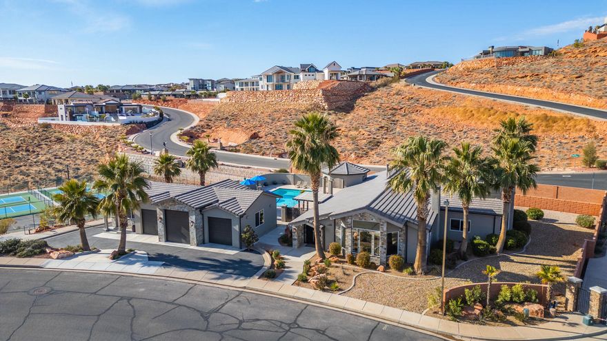 This home has been totally remodeled in 2024  New roof, stucco, carpet, tile, light fixtures, showers and landscaping.  A 3 car garage has been added with a guest casita. You won't be disappointed with all the amenities this home has to offer.  Beautiful views of Pine Mountain on one side to views of the Red Cliffs temple and city lights on the other side.   If you are a pickleball fan, you will love having 2 of your own private courts to watch or play the exciting game of pickleball.  1/2 bath located close to the courts. Large and inviting pool, with plenty of patio space to lounge in your favorite poolside chair.  Hot tub is located just outside the door of your master bath.  There is a poolside bath with shower and toilet. Hard to find this almost an acre and a half in the city!