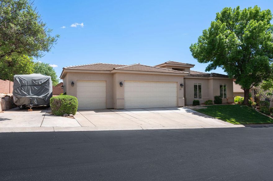 Well-maintained property that has been primarily used as a second home. The residence features an open kitchen floor plan with updated LVP flooring, new carpet, and tall ceilings throughout. The primary bedroom includes a walk-in closet and a separate entrance leading to a private back patio. Additional highlights include a large 805 sq ft, three-car garage with extra ceiling storage and dedicated RV parking.
The home is situated in an excellent location close to schools, shopping, and biking/walking trails. Residents also enjoy access to a community pool, hot tub and pickle ball courts! Home is on Dixie power! All information is deemed accurate, buyer and buyers agent are responsible to verify all information to buyers satisfaction.