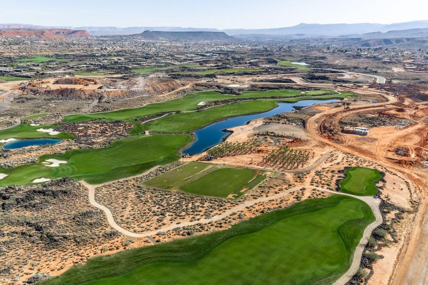 Exceptional 0.70-acre corner homesite along the 14th tee box with sweeping fairway views toward Red Mountain and filtered views of the 13th fairway and pond. Prime location at the entrance to Silver Reef's exclusive enclave-ideal for a custom desert estate. Overlooks Tom Weiskopf's 73rd and final championship course, host of the PGA Tour Bank of Utah Championship. Ownership includes Black Desert Club membership with no initiation fee, offering world-class golf, seven dining venues, luxury spa, state-of-the-art fitness, and the upcoming 5-acre Black Desert Rapids water park featuring both family-friendly attractions and dedicated adult-only activated areas, plus the new Championship Pickleball facility and event arena. Located in Santa Clara near St. George, 300+ days of sunshine abound. Rare opportunity on a premier, bucket-list golf course.