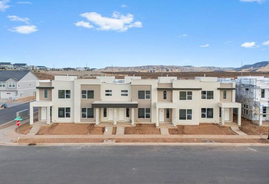 NEW TOWNHOME UNIT! You won't want to miss this opportunity! This spacious townhome features an open layout on the main level. The kitchen is finished with quality white cabinets with sleek white quartz countertop. Upstairs has a nice loft space and the bedrooms have generous closets. Primary bathroom has beautiful luxurious shower with tile surround and euro glass. This home has access to the amazing Desert Color amenities including the 2.5 acre lagoon, pool/hot tub, and pickleball courts. This home is not nightly rental approved. Pictures of home are of the model home which is an end unit. Please call Matt Shelton with any questions. Thanks!
