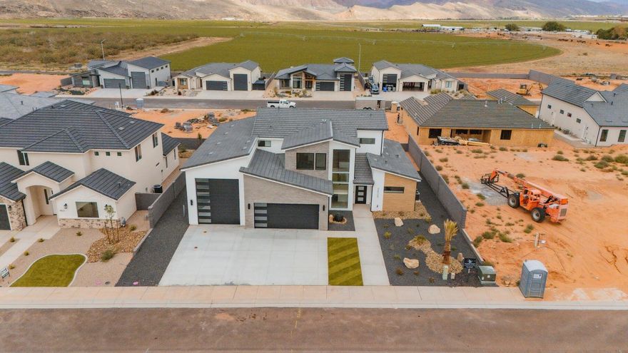 ~52' DEEP RV GARAGE~ 360 Degree Landscaping~ 

ANOTHER ONE BY BIG ROCK HOMES in the sought-after Sand Hollow Village.

 This home's stand out features is its massive 52-FOOT DEEP RV GARAGE (12' wide x 14' tall door)! Inside, you'll find an open-concept layout with LUXURY FINISHES, spacious bedrooms, and LARGE BACKYARD WITH ROOM TO ADD A POOL! 

-Ask about lender incentives!-

This property comes equipped with premium SMART HOME features including 3 wired in insecurity cameras and a door bell camera. Just minutes from Sand Hollow Reservoir, Sand Hollow Golf Course, the sand dunes, and Zion National Park, you're surrounded by year-round adventure -- boating, biking, hiking, off-roading, and more. Contact listing agent for PRIVATE SHOWINGS.