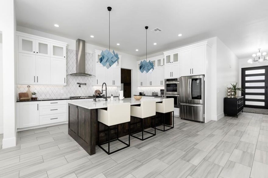 This 3-bed, 3.5-bath home in The Retreat at Sand Hollow offers luxury and adventure. Features include a private pool, open floor plan, gourmet kitchen, two en-suite bedrooms, and bunk room to sleep the entire family. Enjoy stunning views of Zion National Park and easy access to hiking, biking, boating, and more. Your perfect base for Southern Utah living.