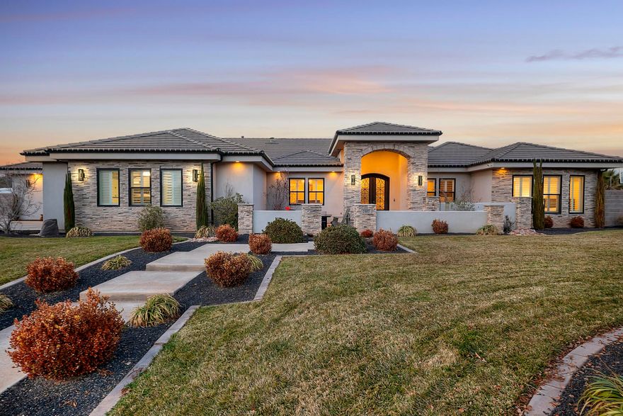 Set on a .68-acre lot in Little Valley / Meadow Valley Farms, this home delivers resort-level living with space, style, and standout amenities. The chef's kitchen is anchored by Thermador appliances, a steam oven, and oversized pantry, flowing effortlessly into the great room with fireplace and dining area. Formal dining, a game room, and private theater create an entertainer's dream. Sleek tile flooring throughout elevates the modern feel.

Outdoors, a private retreat awaits with pool and spa, pickleball court, covered patio with fireplace, built-in BBQ, and room to add a casita with RV garage, gym, sauna, and cold plunge. Sellers have plans to share for previously done rendering.