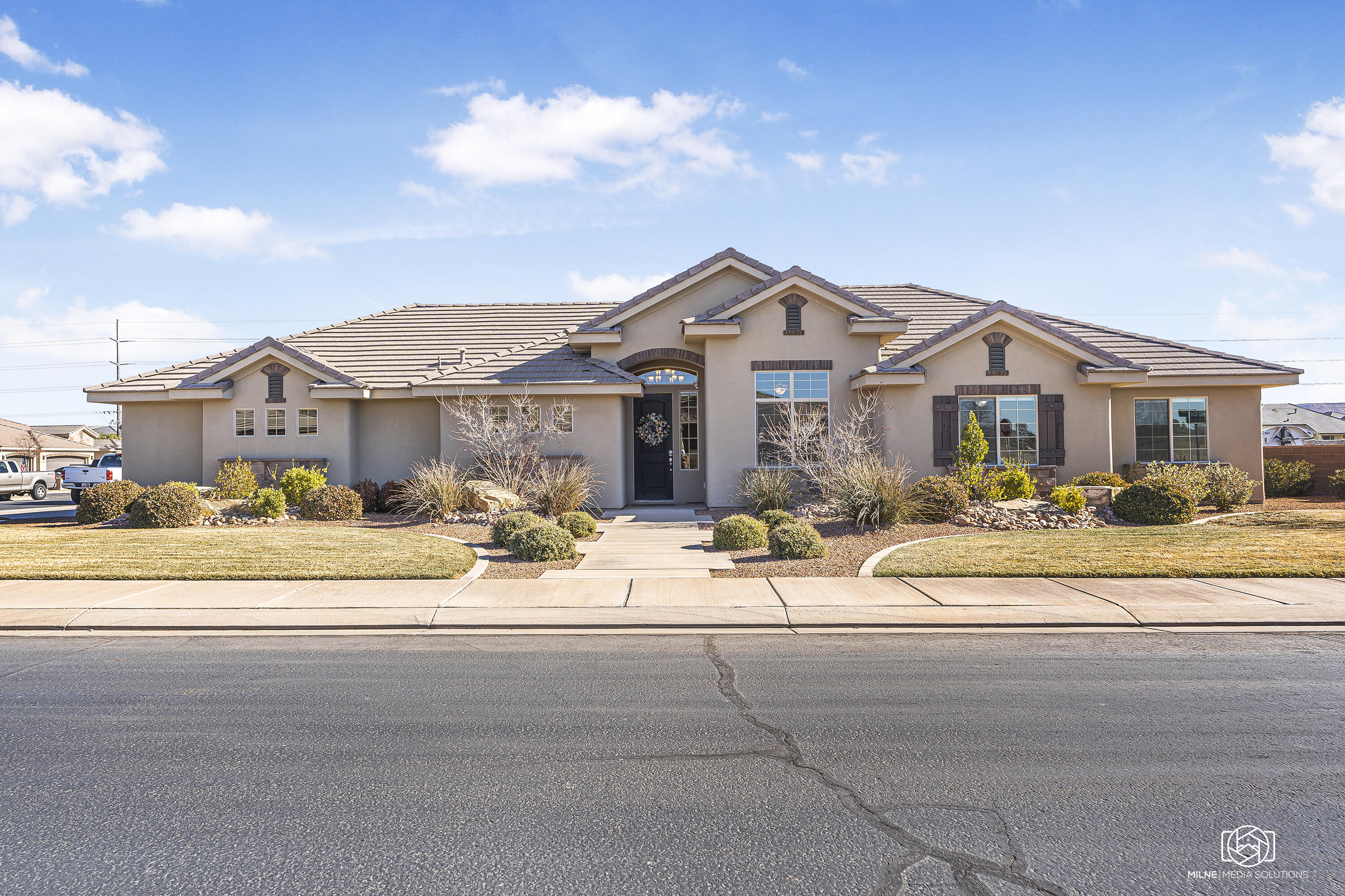 Exceptional 4-bedroom, 2-bath home in Little Valley, St. George, Utah! This move-in-ready gem features vaulted ceilings, natural light, and an open-concept kitchen with granite countertops, a walk-in pantry, and abundant storage. The spacious great room is perfect for entertaining or relaxing. The master suite offers a luxurious ensuite with a double vanity, soaking tub, and walk-in shower. Three additional bedrooms provide flexibility. Outside, enjoy a low-maintenance landscaped backyard with a covered patio. Highlights include a 3-car garage, no HOA, and proximity to schools, parks, and shopping. Style, comfort, and convenience await!