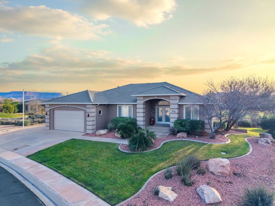 Where the red rocks meet the green at one of the most beautiful golf courses in Southern Utah. Experience unparalleled luxury in this 5 bed, 4 bath home. Nestled in a peaceful neighborhood with year round sunshine, this home offers a front row seat to nature's grandeur.  This isn't just a home, it's a lifestyle defined by serenity and beauty.
3 bed, 2 bath upstairs & 2 bed, 2 bath down, gives ample room for everyone to have their own space. The home boasts lots of natural light. The furnace & AC were installed in 2025, along with a mini split in the master bedroom

RV Storage is available for a fee.

All information herein is deemed reliable but isn't guaranteed. The buyer is responsible to verify all listing information, including square feet/acreage, to the buyer's own satisfaction