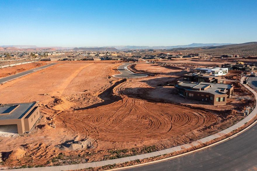 Build your dream home in one of Ivins' most desirable communities. This pad-ready lot in Indigo Trails offers stunning, unobstructed views of Red Mountain, Snow Canyon, and Pine Valley Mountain — the ultimate backdrop for a custom residence designed to reflect your vision and lifestyle. Enjoy close proximity to the Kayenta Art Village, Snow Canyon State Park, Anasazi Ridge Petroglyphs, Fire Lake Park, and the Tuacahn Amphitheatre. World-class wellness resorts like Movara and Red Mountain are just minutes away, blending luxury, adventure, and restoration into daily life. With an Indigo Trails Approved Builder in place, your path to building is streamlined and secure. Start planning your dream home today — this lot is ready when you are. Schedule a site visit to experience these views in person. Opportunities like this don't last  inquire now before it's gone.