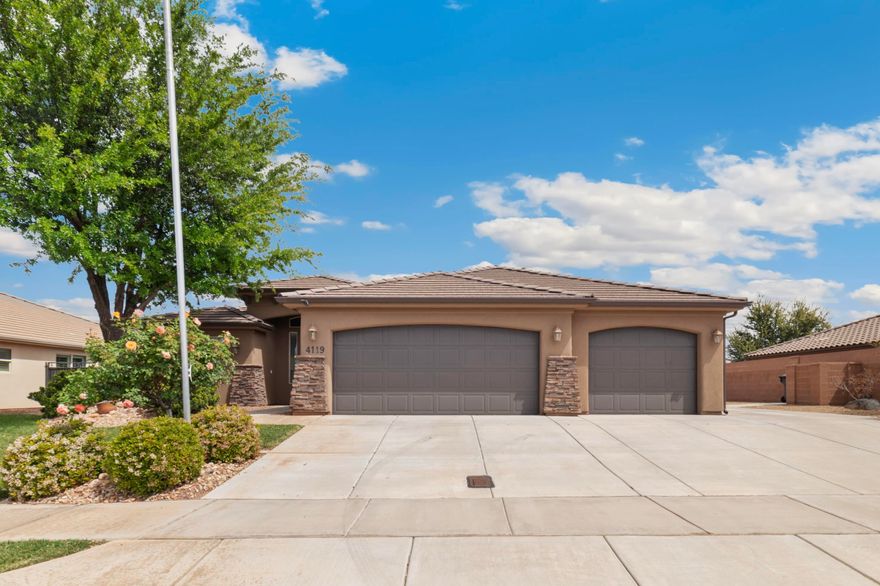 Welcome to this beautifully maintained 3-bedroom, 2-bathroom home located in the highly desirable Treasure Valley community. Perfectly positioned right across the street from a park and within walking distance to Crimson Cliffs schools, this property offers both convenience and lifestyle. Inside, you'll find a spacious and inviting living area, ideal for entertaining or relaxing with family. The home features granite countertops. Step outside to your own private backyard retreat, complete with a pool with power cover-perfect for enjoying warm Southern Utah days with added safety and efficiency. The property also includes 3-car garage, and ample RV parking, making it easy to accommodate all your vehicles and recreational toys.