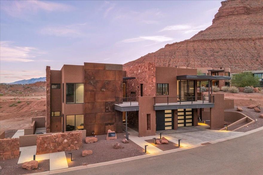 SALES CENTER OPEN 10-3PM M,T,TH,FR,SAT. 
Welcome to Sentierre Padre Canyon, a new model for luxury wellness living. Presenting the exquisite ''Senda'' Villa: a 5-bed, 5.5-bath residence designed by famed architect Mark Philp. This is not just a home; it's a sanctuary in the heart of a rare, protected canyon inside Snow Canyon State Park. The intelligent layout provides the option for 2 lock-off suites with private entries, perfect for legacy planning and rental income through the resort program. Experience a life of intention with Sentierre's active Wellbeing Programs and personalized Path Guides. Ownership is an invitation to become a foundational member of a community built to endure, with world-class amenities on the horizon. Secure your legacy in a pla ***Developers are re-structuring HOA fees, fees will be updated shortly - call agents for details***

More Than Real Estate - A Philosophy You Can Live In

Sentierre is developing not as a place to escape life, but as a setting to live it more intentionally. Every structure and pathway is designed around Six Pillars of Wellbeing: Fun & Confidence Building, Physical Health & Wellness, Emotional & Social Stability, Economic Self-Reliance, Environmental Stewardship, and Personal Security & Safety.

The Sentierre Wellbeing Pathway - Active Now

What truly sets Sentierre apart is already in motion. The Wellbeing Pathway, conceptually guided by world-renowned spa consultant Sylvia Sepielli, is active now, bridging modern treatments with ancient holistic practices. This journey is supported by Path Guides, a new standard of personalized service. Far beyond traditional concierges, Path Guides are trusted advisors who coordinate experiences and build meaningful relationships that deepen over time, transforming a visit into a lifelong journey.

A Vision in Motion: The Future of Sentierre

Ownership now means early access, preferred pricing, and a voice in what's to come. The future taking shape includes:

Desert Hearth Restaurant: An elemental dining experience rooted in open-fire cooking.

Market Café & Pool Bar: A vibrant all-day gathering place for health-focused nourishment.

The Remedy Microbar: A bold take on restoration with botanical cocktails and infusions.

Pool House & Spa Experience: A world-class facility for rejuvenation and relaxation.

Private Member Lounge: An exclusive retreat for Sentierre Members to connect and unwind.

This is a rare opportunity to become a foundational member of a community built to endure. We invite you to discover a more intentional way of living at Sentierre Padre Canyon.