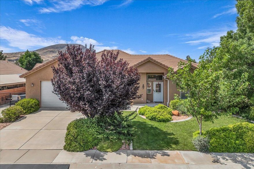 You've found a clean, well-cared-for home in a quiet, low-traffic neighborhood with no HOA just minutes from Sky Mountain Golf Course and a short 25-minute drive to Zion National Park. This 3-bedroom, 2-bath home sits on a peaceful one-way street and features an open layout with plenty of natural light and functional living space. You'll notice the pride of ownership throughout, from the tidy interiors to the mature landscaping, especially the large, established vegetation in the front yard, which is a rare find in Southern Utah. The backyard is wide open and ready for whatever you've been dreaming about—whether it's a pool, garden, or entertainment space. A great full-time home or weekend getaway with access to some of Utah's best outdoor adventures. Don't miss it!