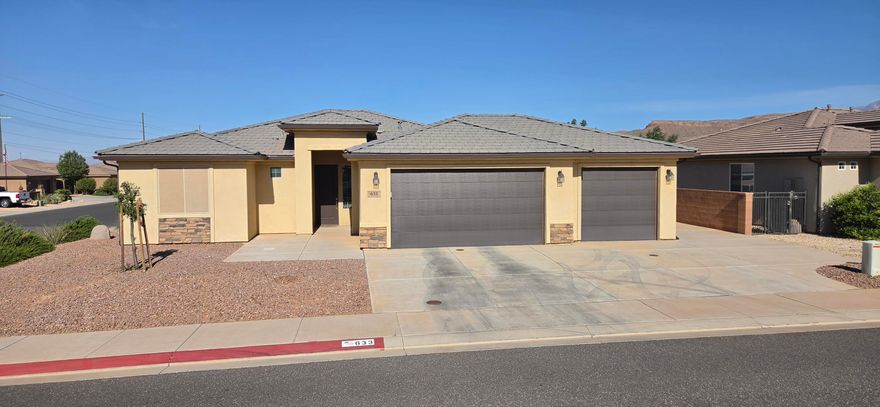 'PROFESSIONAL PICS COMING SOON!'    Beautiful single-level home in Hurricane featuring 3 bedrooms, 2 bathrooms, 1,555 sq ft, and a rare 3-car garage on a .16-acre lot. Open floor plan with tile flooring, granite countertops, rich wood cabinetry, stainless steel appliances, and abundant natural light. Spacious primary suite with dual vanities and walk-in closet. Enjoy the covered patio, low-maintenance yard, and storage shed. Clean, move-in ready, and conveniently located near parks, shopping, and outdoor recreation.