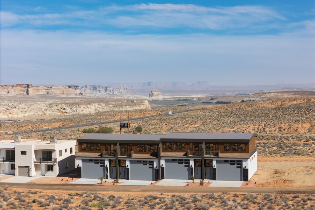 Photo of 1328 E Lone Rock View DR, Big Water, UT 84741 (MLS # 26-276645)
