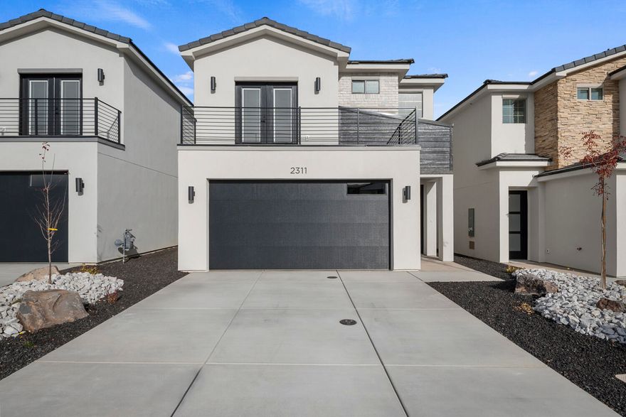 Welcome to the Villa, a thoughtfully designed 1,496 sq ft home offering 3 bedrooms and 2.5 bathrooms. The open-concept main level creates a seamless flow, highlighted by elevated finishes including a spacious kitchen with generous cabinetry and elegant 3cm quartz countertops—perfect for everyday living and entertaining. Abundant windows throughout the home provide beautiful natural light, enhancing the bright and inviting atmosphere. Notable features include convenient laundry cabinets, sleek black door and cabinet hardware, a modern metal railing, and an oversized double vanity in the primary bathroom. With quality finishes and smart design throughout, the Villa offers both comfort and style in a home you'll love. Information is deemed reliable but not guaranteed, buyer to verify info.