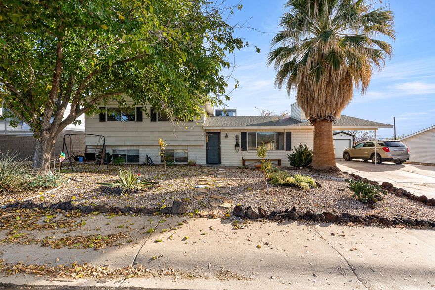 Amazing value on this beautiful tri-level single-family home! Stunning curb appeal and gorgeous trim work throughout. Step inside to an open kitchen featuring granite countertops added in 2018, plus durable new LVT flooring in the lower-level rooms.The expansive, fully-fenced backyard is the real showstopper: covered RV parking, dog run, chicken coop, garden area, in-ground trampoline pit, a brand-new storage shed, and—built just last year—an impressive 30' × 30' insulated detached workshop/garage with a 10' × 10' roll-up door. It's perfect for projects, equipment, or additional vehicles and delivers utility and storage most homes can only dream of. All this at a fantastic starter-home price and only needing a little TLC to truly shine—move fast, because this one won't last long!