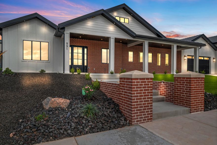 NEW LUXURY CUSTOM HOME, in the very convenient Grand Heights neighborhood w/ BEST VIEWS & close to shopping, restaurants & downtown St George. Enjoy off road adventures to PINE VALLEY Mountain, with immediate access from this gorgeous property. This home boasts 3 bedrooms, with separate office, 2.5 bathrooms & many upgrades. It has 10' ceilings throughout home & coffered ceilings in multiple rooms, to give it a more open feel. There is ample covered patio in backyard with options to create your own private oasis. The oversized 4 car garage with an extra deep RV Garage is sure to please everyone, including an outlet for the electric car. The beautiful kitchen area is spacious, with plenty of room for entertaining & the laundry/mud room is huge.  Come see this one anytime, its easy to show.