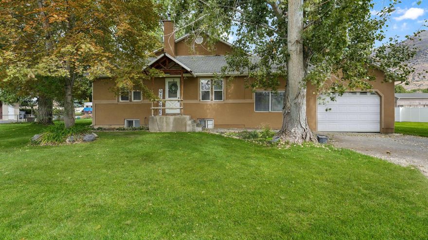 Charming home on 1.03 acre in Pleasant Grove with breathtaking views of Mt. Timpanogos and Alpine Canyon. Fully remodeled in 2014, this home offers four spacious bedrooms and two baths, including a spacious primary suite with a walk in closet and ensuite bath. The kitchen is beautifully appointed with custom cabinetry, granite countertops and a stylish backsplash. The backyard is a dream featuring a sprawling deck perfect for gatherings, mature shade trees, and a full auto sprinkler system to keep the grounds lush. Adding to the appeal is a 45 X 55 basketball court and pickleball court, creating the perfect setting. Property is zoned R-R which allows for animal rights.