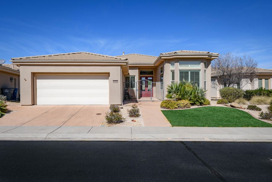 Modern Single-Level Living in golf community of Sunbrook.  This home features 2 bedrooms, plus an office, the interior is well-kept with travertine floors, neutral paint, and an open floor plan with high ceilings. The Sunbrook community offers more than just golf; residents have access to pickleball, indoor and outdoor pools, playground and both a workout and weight room. All positioned near local hiking and biking trails, with restaurants and shopping just a short drive away. This property is move-in-ready in one of St. George's established neighborhoods.