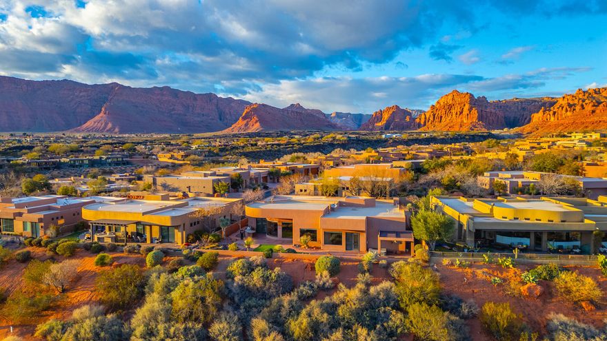 This home has stunning views of Kachina Cliffs, the Entrada Golf Course 7th and 8th fairways. Has common area to give you space and privacy from the golf course, too. These lots paid a higher premium when The Cliffs of Snow Canyon was being developed. Home has large living area, kitchen, bar - plenty of room to entertain and also enjoy the quiet ambience of views, and common area with beautiful landscaping and birds as they migrate in different seasons. This is a must see for anyone wanting to own property in The Cliffs of Snow Canyon! This subdivision has their own amenities: clubhouse, kitchen, entertaining area, exercise room with incredible views, pools, and hot tub. The Cliffs also has lower HOA's and the option to join The Entrada Country Club. Check with Jordan Barnes, Entrada Membership Director. The Cliffs of Snow Canyon has access to hiking trails, The Scout Caves -- just a ton of options with owning a home in this subdivision. It is highly sought after for lower HOA's and option to join The Entrada Country Club.