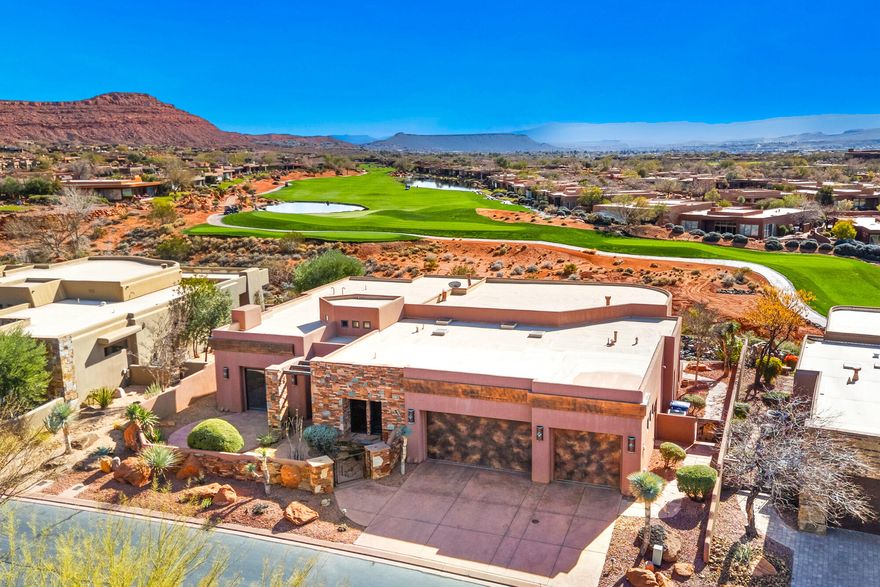 This home has stunning views of Kachina Cliffs, the Entrada Golf Course 7th and 8th fairways. Has common area to give you space and privacy from the golf course, too. These lots paid a higher premium when The Cliffs of Snow Canyon was being developed. Home has large living area, kitchen, bar - plenty of room to entertain and also enjoy the quiet ambience of views, and common area with beautiful landscaping and birds as they migrate in different seasons. This is a must see for anyone wanting to own property in The Cliffs of Snow Canyon! This subdivision has their own amenities: clubhouse, kitchen, entertaining area, exercise room with incredible views, pools, and hot tub. The Cliffs also has lower HOA's and the option to join The Entrada Country Club. Check with Jordan Barnes, Entrada Membership Director. The Cliffs of Snow Canyon has access to hiking trails, The Scout Caves -- just a ton of options with owning a home in this subdivision. It is highly sought after for lower HOA's and option to join The Entrada Country Club.
