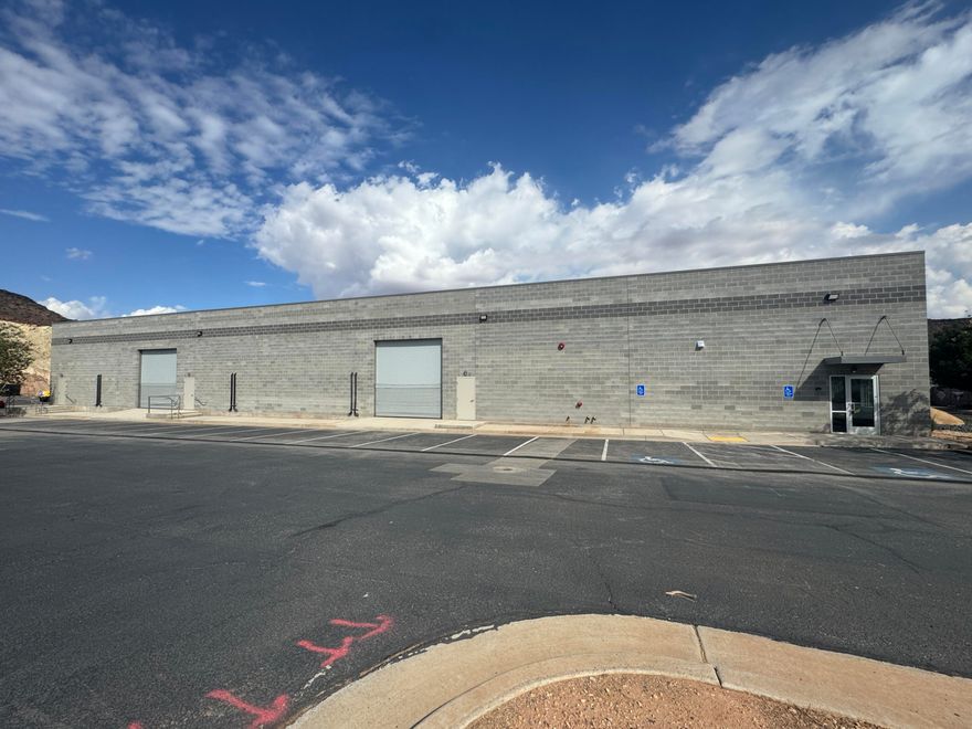 Grouted Block building. 7 man doors, 4 roll up doors 14' high. 2 loading docks with ramp doors. Ceiling height of 16'. Climate controlled with Three phase power. 2, 7.5 ton units in ware house area. Separate HVAC unit for office and conference spaces. Mezzanine space of approx. 1,000 sq. ft. Office/entry approx. 400 sq. ft. 2nd office space, 400 sq. ft Conference room 500 sq. ft approx. Mens/Womens restrooms with 3 stalls each, + mens 2 urinals, 1 full ADA bathroom with shower, +1 ADA bathroom. Sellers interested in doing owner financing.