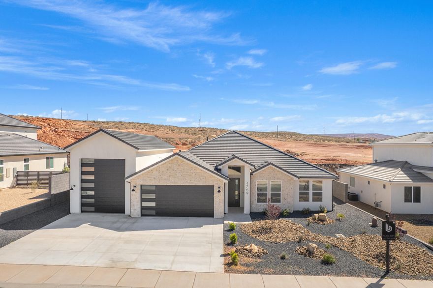 ~ OVERSIZED 52' DEEP RV GARAGE~
Full landscaping included

This stunning home in the sought-after Sand Hollow Village area blends modern comfort with the ultimate recreational lifestyle. 

- Ask about adding a pool-

One of the home's standout features is the massive 52-FOOT DEEP RV GARAGE (12' wide x 14' tall door)! Inside, you'll find an open-concept layout with LUXURY FINISHES, spacious bedrooms, and LARGE BACKYARD WITH ROOM TO ADD A POOL! 

This property comes equipped with premium SMART HOME features including 3 wired in insecurity cameras and a door bell camera. Just minutes from Sand Hollow Reservoir, Sand Hollow Golf Course, the sand dunes, and Zion National Park, you're surrounded by year-round adventure - boating, biking, hiking, off-roading, and more. 

Contact listing agent for PRIVATE SHOWINGS & ADDITIONAL INCENTIVES!