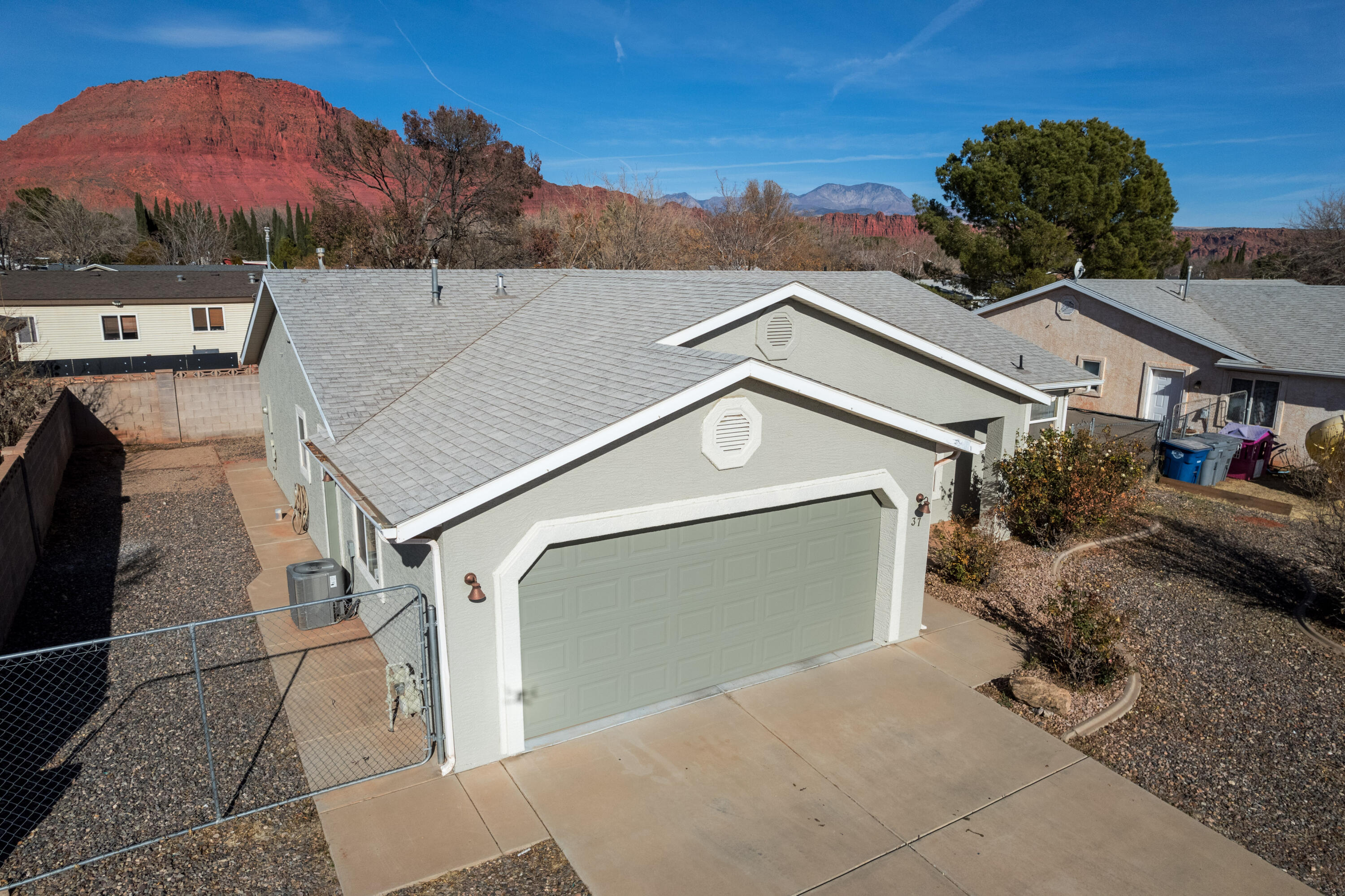 A delightful 3-bed, 2-bath single-family home built in 1997. This cozy 1,380sf house sits on a 5,227sf lot, offering the perfect
blend of comfort and convenience. There's a hot tub in the fenced backyard, room for boat or RV parking on the side of the
house and plenty of vehicle parking in the 2 car garage. Ivins is a highly sought after area and homes in this area don't often
come available in this price range. Enjoy the peaceful, small-town vibe, with its strong sense of community. Just a short drive
away is St. George, known for its stunning red rock landscapes, dining, shopping, and entertainment. Nearby Veyo offers
delicious pies and the refreshing Veyo Pool. Don't miss the local farmers markets for fresh produce and handmade goods.