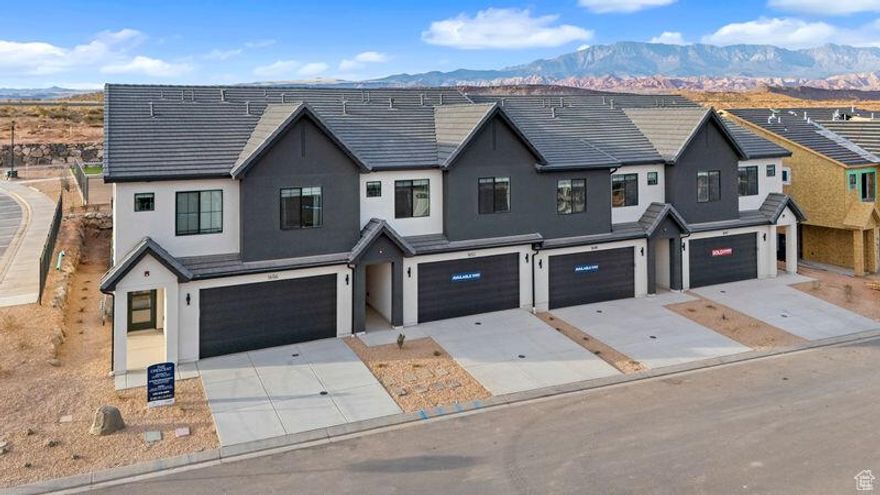 NIGHTLY RENTAL APPROVED - END UNIT - $13,000 toward closing costs with our preferred lender DHI Mortgage! May occupancy! You'll find a smartly designed townhome with the Crescent floor plan in our Long Valley community, in Washington City. The Crescent is a 2-story townhome with 4 bedrooms, 4.5 baths, a 2-car garage. On the first floor, the home can be accessed through a covered front porch, or a garage that leads to the kitchen. A powder bath is conveniently tucked away between the garage and kitchen, providing privacy for guests. The main living space is an airy, open-concept kitchen, nook and family room with plenty of space.