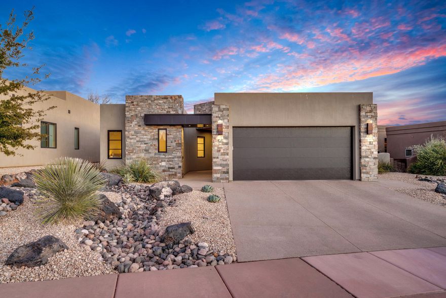 Contemporary design, built in 2019 by Tobler Homes. Open, airy layout with soaring ceilings. Sunlight floods every room. Chef's kitchen with premium finishes. Three bedrooms plus office. Spa-inspired baths. Peaceful water feature outside. Gated privacy near Entrada, Black Desert, and Snow Canyon. Spacious two-car garage. Modern luxury in the heart of Southern Utah.