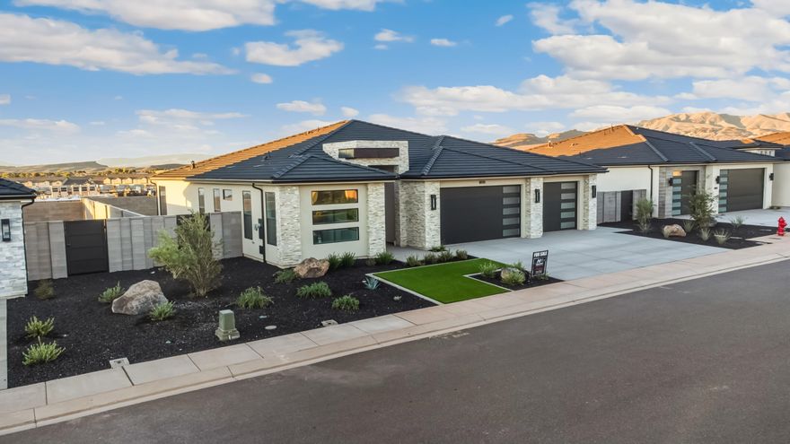 The Astoria at Solace features an open floor plan with 4 bedrooms and 3.5 bathrooms, and a 3-car garage. Behind the 3rd garage is an casita with a bedroom, kitchenette and bathroom. The casita is accessible from both inside and outside the home. The primary suite has a spacious bathroom, walk-in closet. Large windows and sliding glass doors offer views from all locations in the great room. The home also features a rooftop deck with 360 views of the surrounding area.  Home is near grocery, shopping and Black Desert Resort.