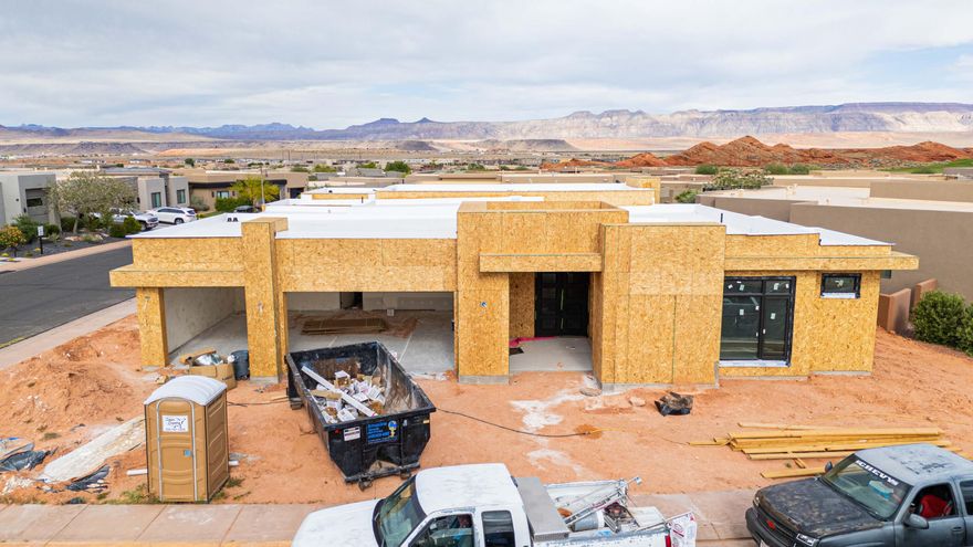 ESTIMATED COMPLETION JULY-AUGUST 2026. Located in The Dunes at Sand Hollow in Hurricane, this beautifully designed 3-bedroom, 3.5-bathroom home offers 2,976 square feet of refined, single-level living within a premier golf course community.

The third bedroom is a standout feature, complete with its own private exterior entrance, kitchenette, and direct access to the main home--ideal for a guest suite, casita, or potential ADU.

Homeowners enjoy access to Sand Hollow Golf Club amenities, including the championship golf course, clubhouse, dining, fitness center, and community pool. The HOA maintains common areas and landscaping, supporting a low-maintenance, well-kept lifestyle.

An optional pool upgrade is available at an adjusted price, offering the opportunity to enhance your outdoor living experience!

Call/Text Camberlee with any questions