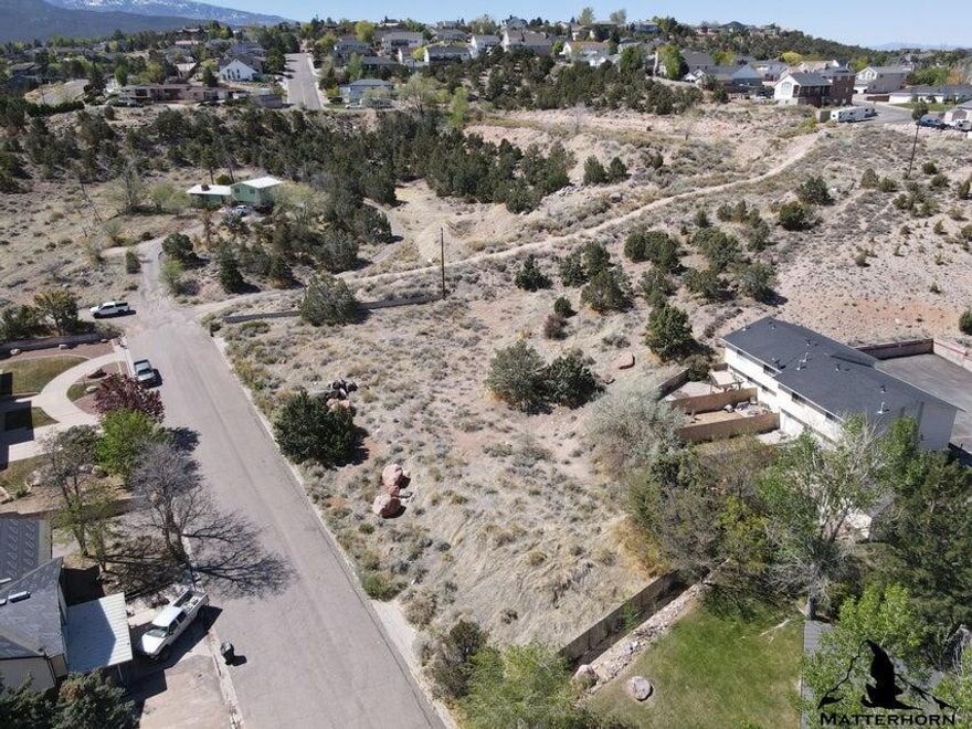 Aime Ave. Details: • 1.03-acre multifamily development lot located at 53 N. Aime Ave., Cedar City, UT 84720 • Zoned R-3-M with no CC&Rs • All utilities are stubbed and ready to build • Walking distance to Southern Utah University, ideal for student or workforce housing • Previously approved by the city for a 24-unit apartment complex or an 8-lot PUD (8 individual townhome lots with separate tax IDs) • Fully engineered, city-approved, and ready for development • Includes multiple engineered and stamped plan sets (3 options total), soils report, and completed civil work • Property has been owned for over 5 years, with 100+ hours invested in planning and due diligence • Seller is motivated due to bandwidth being full with other projects Development flexibility and options:

" Build and hold as a 24-unit apartment complex. (allows up to 24 units because it is over 1 acre)

" Subdivide into 8 separate townhome lots, with twin homes and basement studios (16 total doors)

" Develop for short-term rentals (Airbnb demand in Cedar City is strong)

" Subdivide and sell individually

" Execute a phased buildout or bring in partners/investors

Additional notes:

" Strong rental demand in the area across multiple use cases (student housing, long-term rentals, and short-term rentals)

" Due diligence has already been completed, saving significant time and upfront cost for a buyer or builder

" Very few (if any) vacant lots of this size with R-3-M zoning available this close to campus