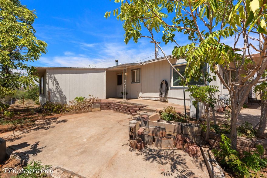 Charming home with a view and plenty of room for gardening. Three bedroom 1 bath with detached garage and no HOA give owners freedom. Why rent when you can own!  Bring your qualified buyers and/or investors. Agent related to seller.