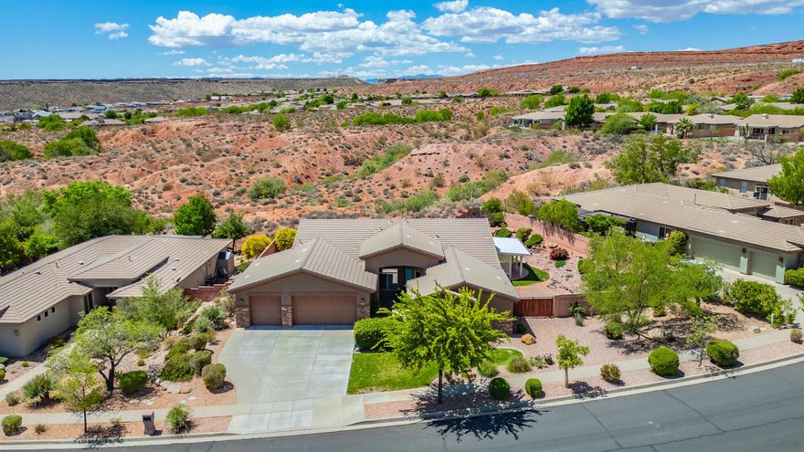 Welcome to 2187 N Territory Canyon Dr, located in the highly sought-after Coral Canyon community of Washington, UT. This smart and spacious home is loaded with thoughtful upgrades, energy-efficient systems, and even includes a private-income-producing casita!
Inside, enjoy the comfort of dual-zone A/C (with one unit replaced in 2024), a gas fireplace, and a home pre-plumbed for both a water softener and central vacuum. App-controlled features include Everlights for year-round exterior lighting, a Ring doorbell, and a Beehive smart irrigation system. A new washer (2024) and dryer can be included. Secluded Backyard oasis w/heated pool overlooking open space & views of Pine Valley Mountain- accessed from kitchen, living room, Master bedroom or 3rd bay of garage