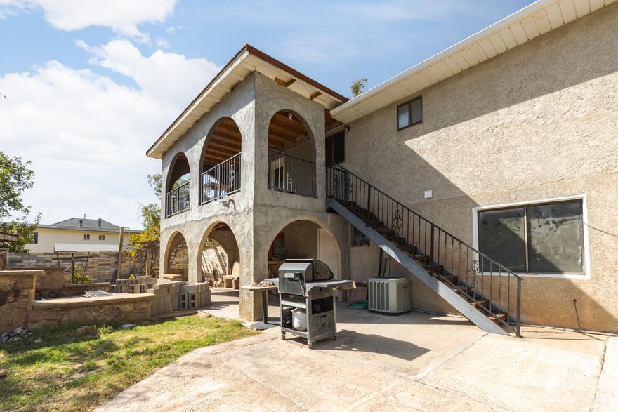 Commercial zoned house. Creative financing loans for Self Employed buyers. Possible uses: Auto repair, motel, dry cleaning, self storage, child care center, vehicle & equipment rental. Driveway on the east side of the house, allows access the large backyard for events. Located behind Napa Auto parts store. Near retail stores in Highway Commercial zone. On the ATV route of 100 N.  Zoned General Commercial (GC).  Seller financing.